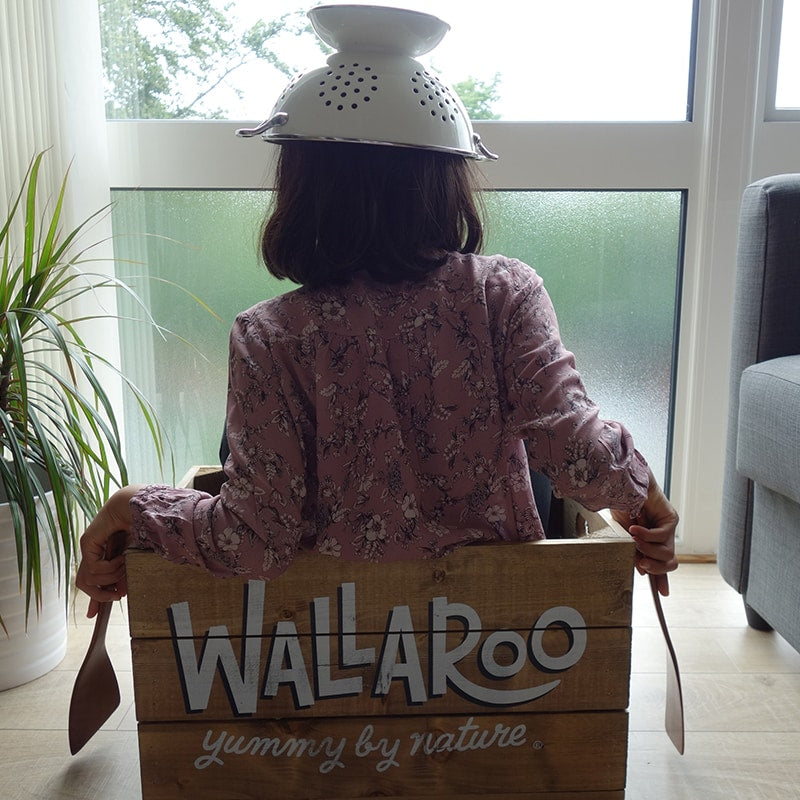 Wallaroo picture of girl on crate
