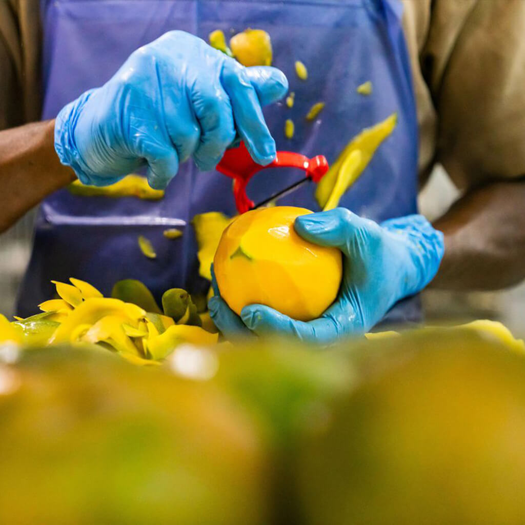 Mango being peeled